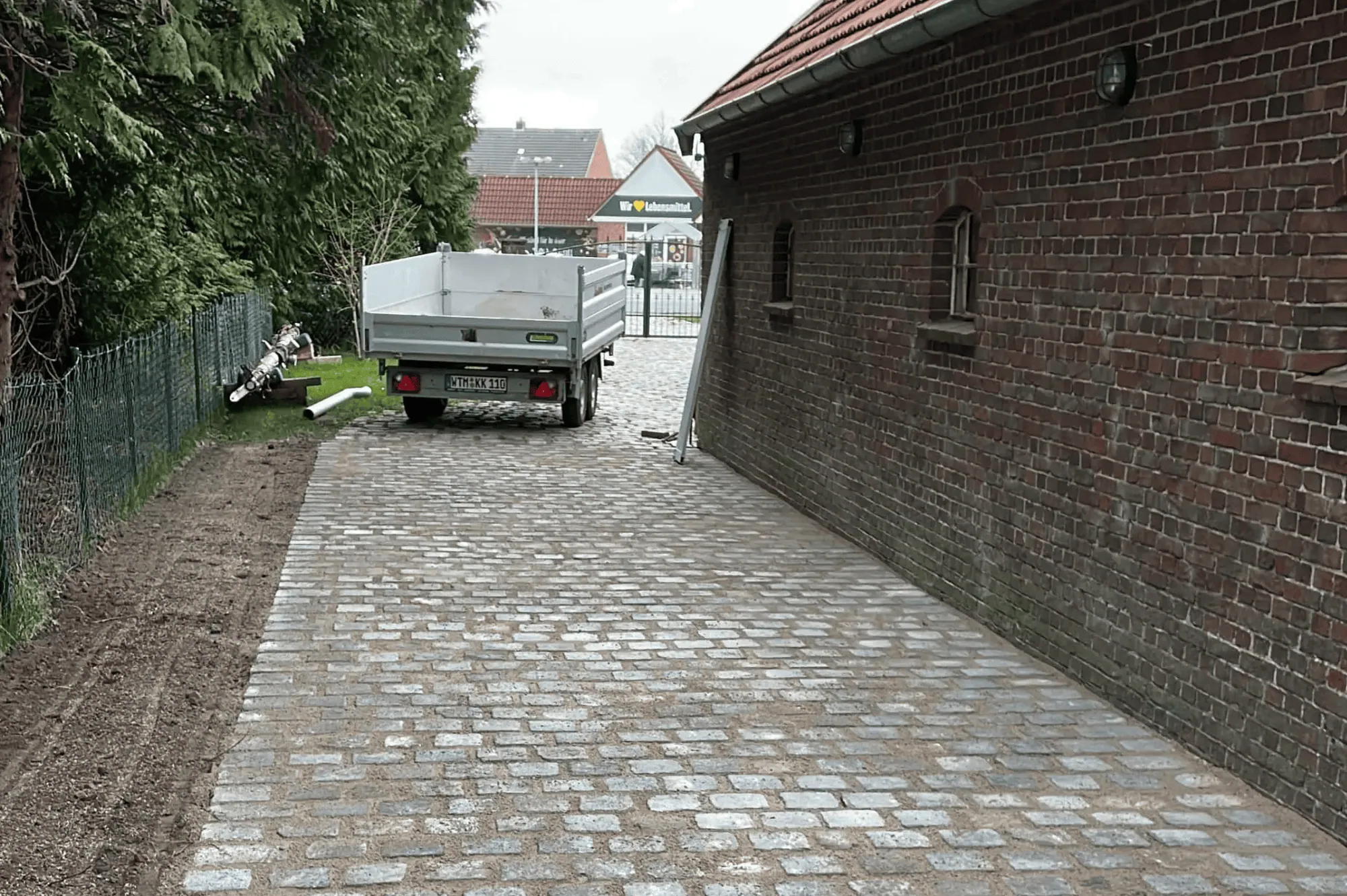 Natursteinpflaster für Zufahrt – Kunstreich Galabau Wittmund